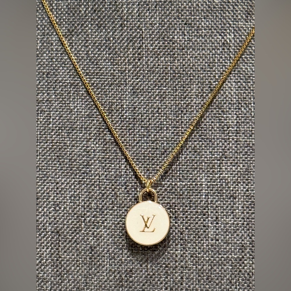 Up cycled Louis Vuitton Gold Lock on unbranded 18 inch 18 K Gold Plated chain.